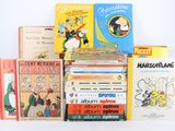de nombreux livres pour enfants empilés les uns sur les autres