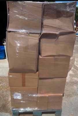 a large stack of boxes sitting on a pallet
