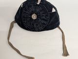 an image of a black purse with a flower on it