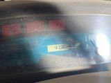 a close up of the dashboard of a car with a sticker on it