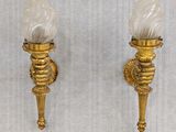 pair of antique brass wall sconces with frosted glass shades