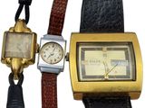 two watches that are sitting next to each other