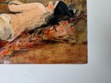 a picture of a painting of a woman laying on a bed