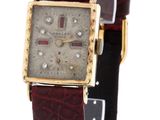 l'image d'une montre-bracelet avec un bracelet en cuir marron