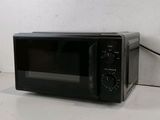 a black toaster oven sitting on a white counter