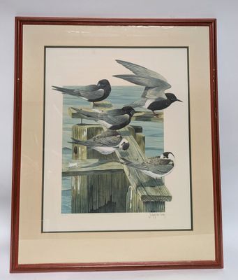 a picture of a group of birds sitting on a wooden post