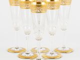 un service de six verres à vin à bord doré