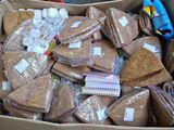 a box full of food that is sitting on the floor