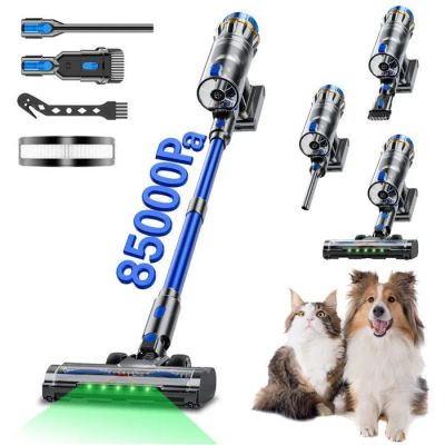 a dog and a cat sitting next to a vacuum