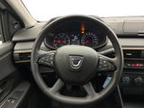 the interior of a car with a steering wheel and dashboard controls