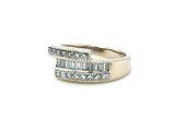 a close up of a diamond ring on a white background
