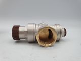 a close up of a metal pipe with a red cap