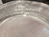 a close up of a metal pan on a table