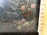 un tableau représentant une femme tenant un bouquet de fleurs