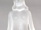 an image of a glass sculpture of a woman with a knife in her hand