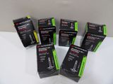 six black and green packagings for a new product on a white surface