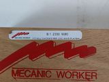 a wooden box with a red sticker that says mechanic worker