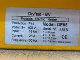 a close up of the back of a yellow truck with a label on it