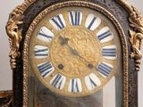 a clock that is sitting on top of a table