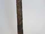 a vase that has a wooden handle on it