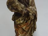 an image of a statue of a woman holding a child