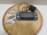 a nintendo wii game system sitting on top of a wicker tray