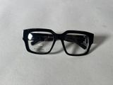 glasses on a table with a white surface and a white background