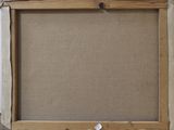 an old picture frame with a piece of wood sticking out of it