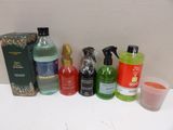 many different types of cleaning products sitting on a counter