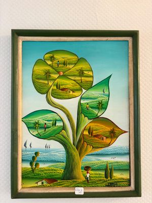 une photo d'un tableau représentant un arbre accroché au mur