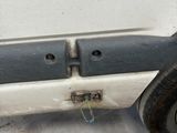an image of a car with a flat tire on it