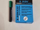 a pen and a box of ink sitting on a table