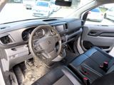 the interior of a car with a steering wheel and dashboard