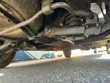 a close up view of a car ' s exhaust pipe and exhaust pipe