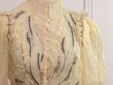 an image of a mannequin with a yellow dress on it