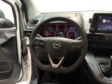 a picture of a car dashboard with a steering wheel and dashboard controls