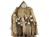 a statue of a man with a group of people on it
