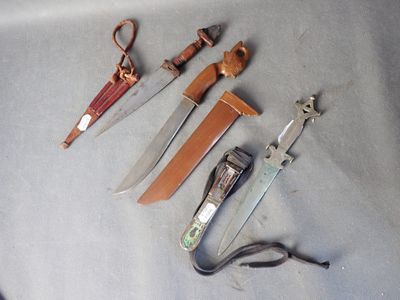 three different types of knives on the table