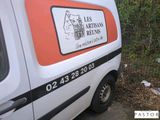 a van that is parked on the side of the road