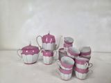 service à thé en porcelaine rose et blanche, avec tasses et soucoupes assorties