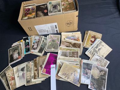 a box full of old postcards on a table