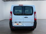 a white van that is parked inside of a building