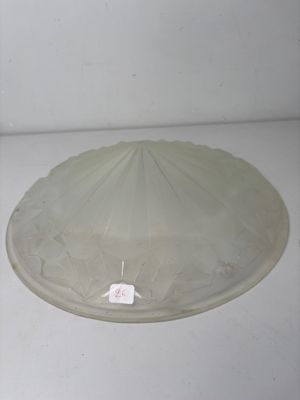 a white microwave oven with a glass cover on it