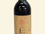 a bottle of wine that is sitting on a table