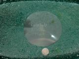 a green bowl with a message written on it