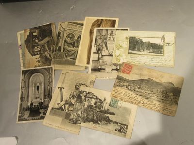 many old photos of people and animals on the table