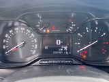 a close up of a car dashboard with a speedometer and gauges