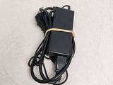 an image of a power cord and a charger on a table