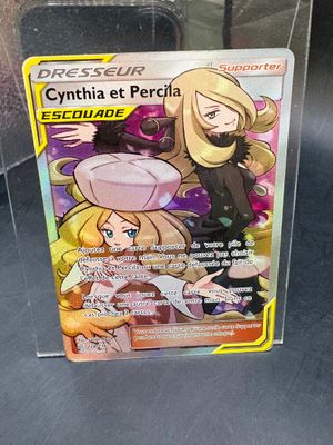 a box of pokemon cards sitting on a table