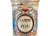 a small jar that has a label on it
